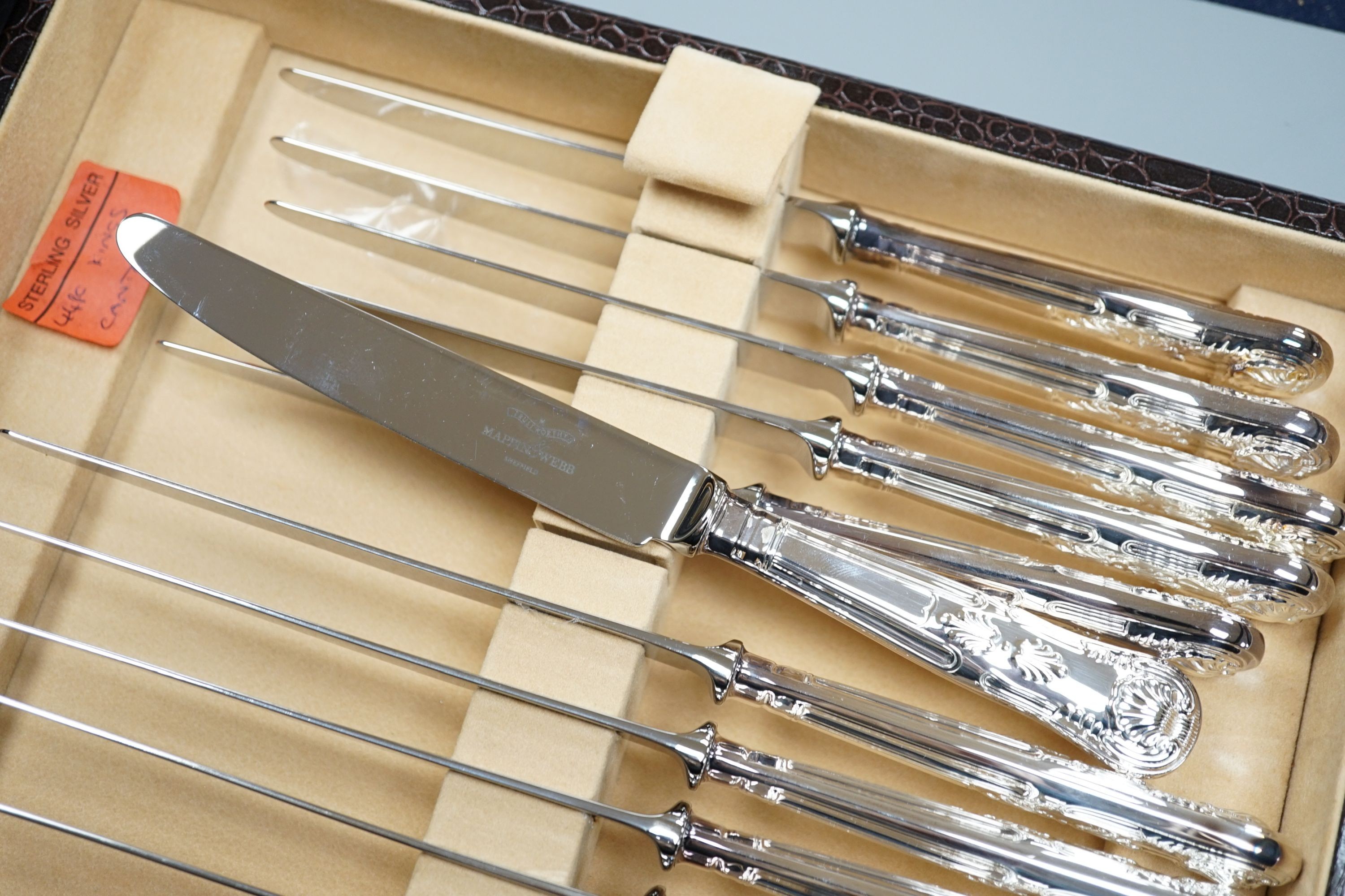 A cased modern silver forty four piece canteen of King's pattern cutlery by Mappin & Webb, Sheffield, 2004, weighable silver 76oz.